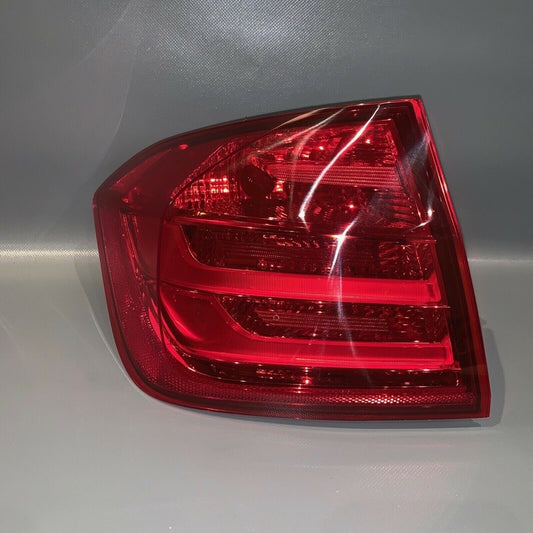 7372785-01 BMW 328i 335i TAIL LIGHT LEFT DRIVER 4-DOOR SEDAN 2012 2013 2014 OEM
