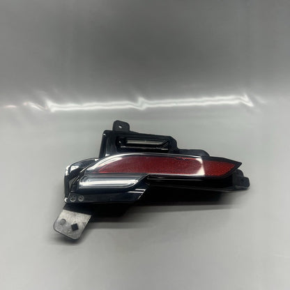 1979444-10-D TESLA MODEL Y JUNIPER REAR VALANCE TAIL LIGHT REFLECTOR LEFT DRIVER 2025 OEM 