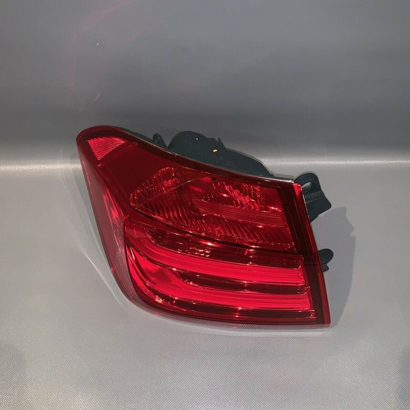 7372785-01 BMW 328i 335i TAIL LIGHT LEFT DRIVER 4-DOOR SEDAN 2012 2013 2014 OEM
