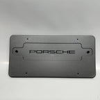 99670110700 PORSCHE 911 BOXSTER LICENSE PLATE BRACKET 1997 98 99 2000 01 02 03 04 2005 OEM