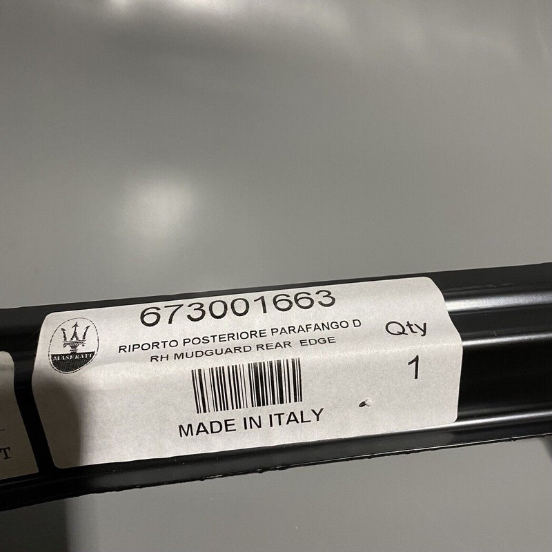 673001663 MASERATI GHIBLI MUDGUARD REAR EDGE RIGHT OEM 2014 2015 2016 673001663