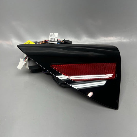 1730599-00-B TESLA MODEL 3 HIGHLAND CHARGE PORT DOOR REFLECTOR LEFT 2025 OEM 1730599-00-B