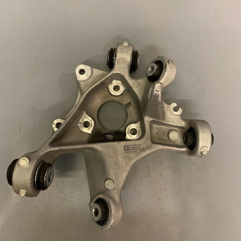 1044411-00-F TESLA MODEL 3 RWD/DM LEFT REAR SPINDLE KNUCKLE 2017 2018 2019 OEM