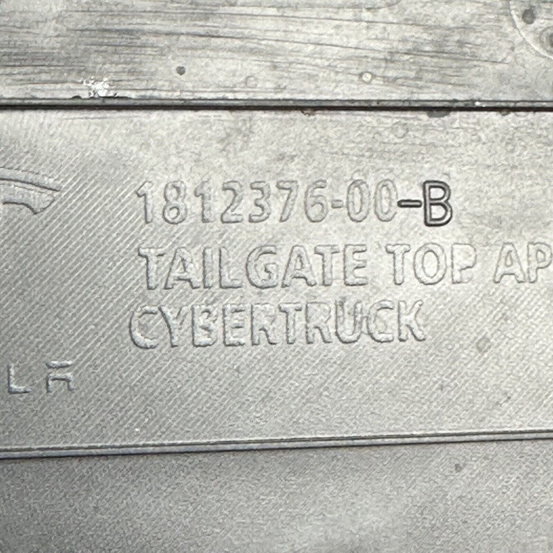 TESLA CYBERTRUCK TAILGATE TOP APPLIQUE 2024 2025 OEM 1812376-00-B